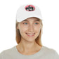 repeak energy dad hat, black, white, and pink, front side on model